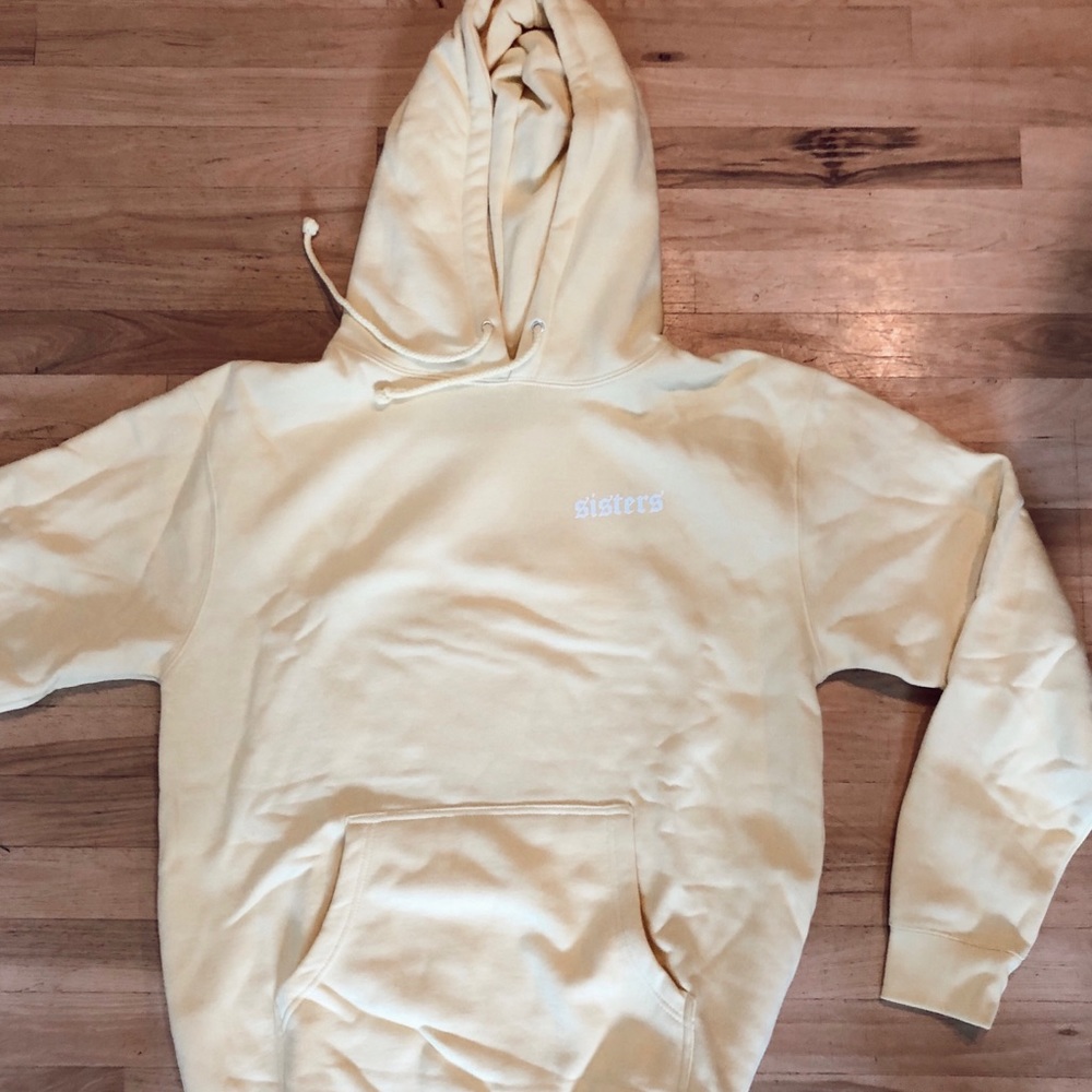 James Charles Sisters apparel yellow hoodie